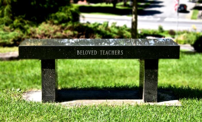A lovely bench monument with custom etch work. 